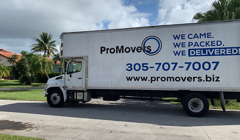 A moving truck driven by long-distance movers Miami based.